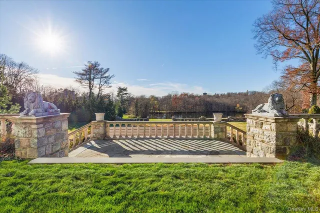 a view of backyard of house with seating space