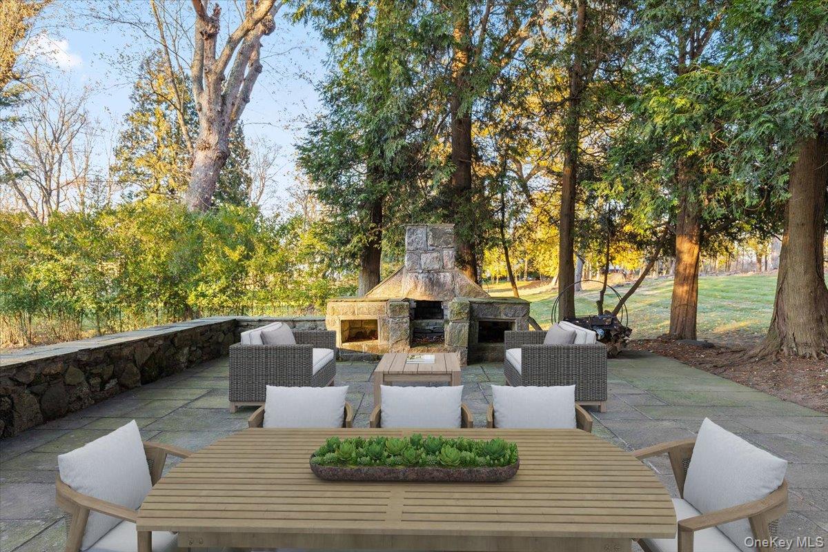 83 Somerstown Road Ossining, NY 10562 - Photo 5 of 38 a view of backyard of house with seating space