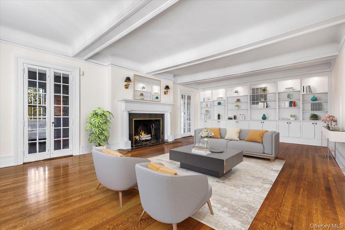 83 Somerstown Road Ossining, NY 10562 - Photo 9 of 38 a living room with furniture and a fireplace