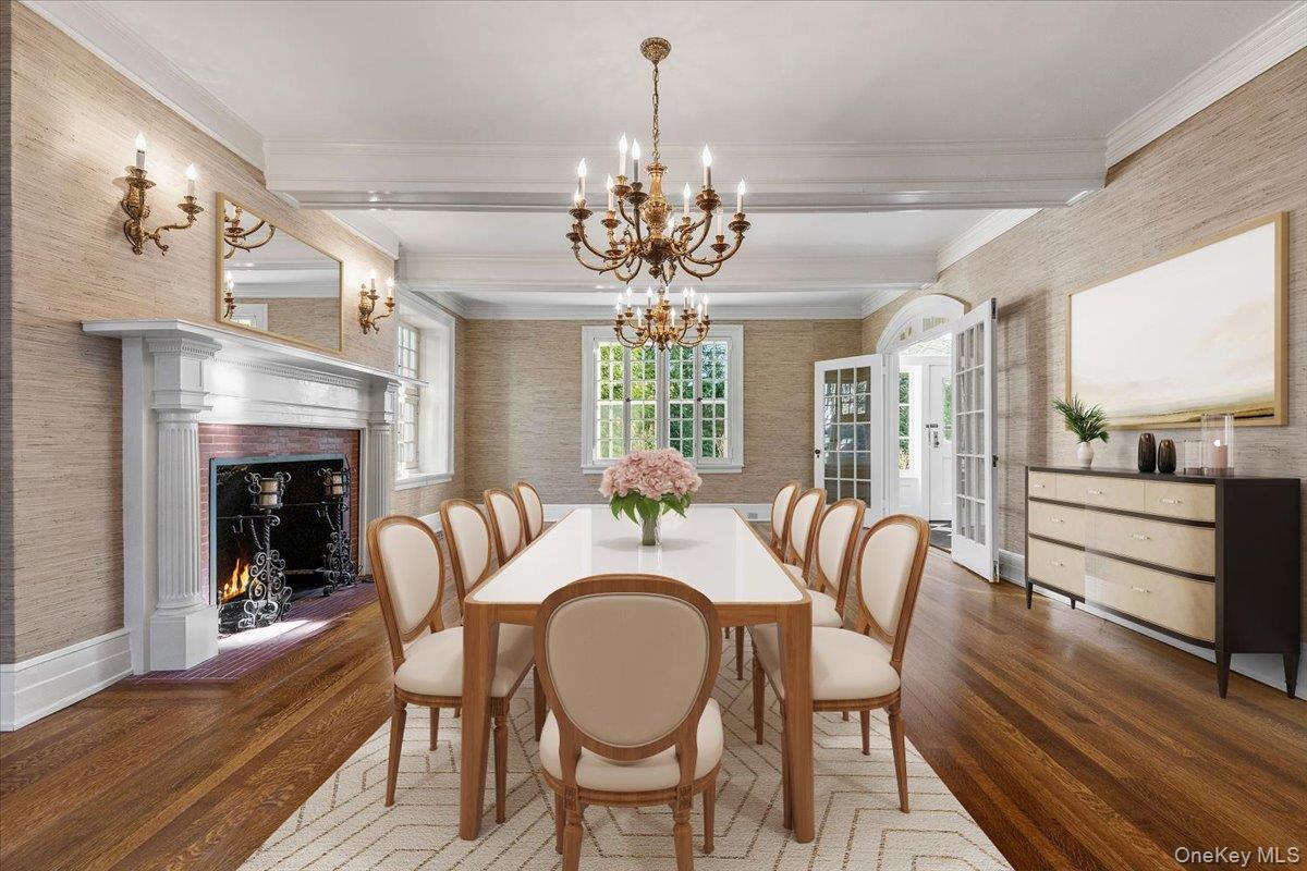 83 Somerstown Road Ossining, NY 10562 - Photo 10 of 38 a dining room with furniture a chandelier and wooden floor