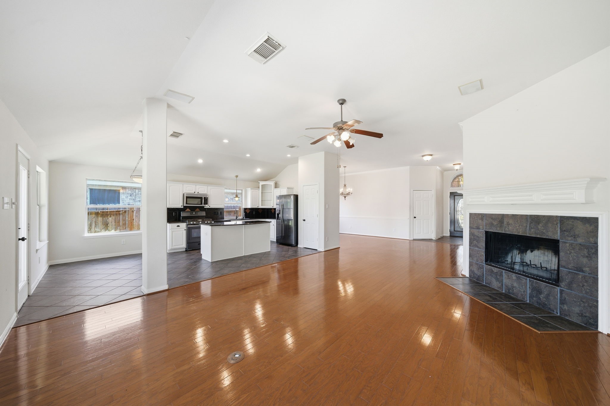 17714 Sunset River Lane Houston, TX 77084 - Photo 4 of 20 a view of a livingroom with a fireplace