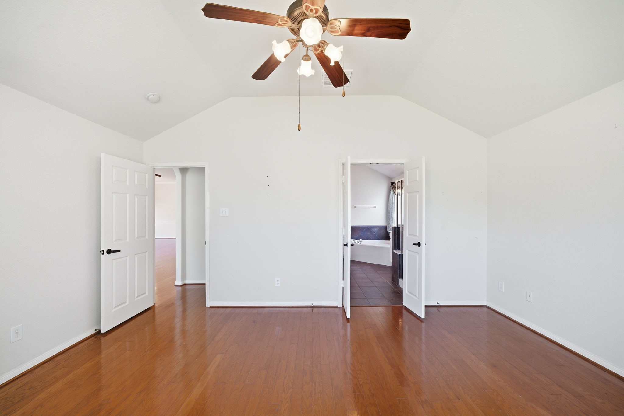 17714 Sunset River Lane Houston, TX 77084 - Photo 9 of 20 a view of empty room with wooden floor