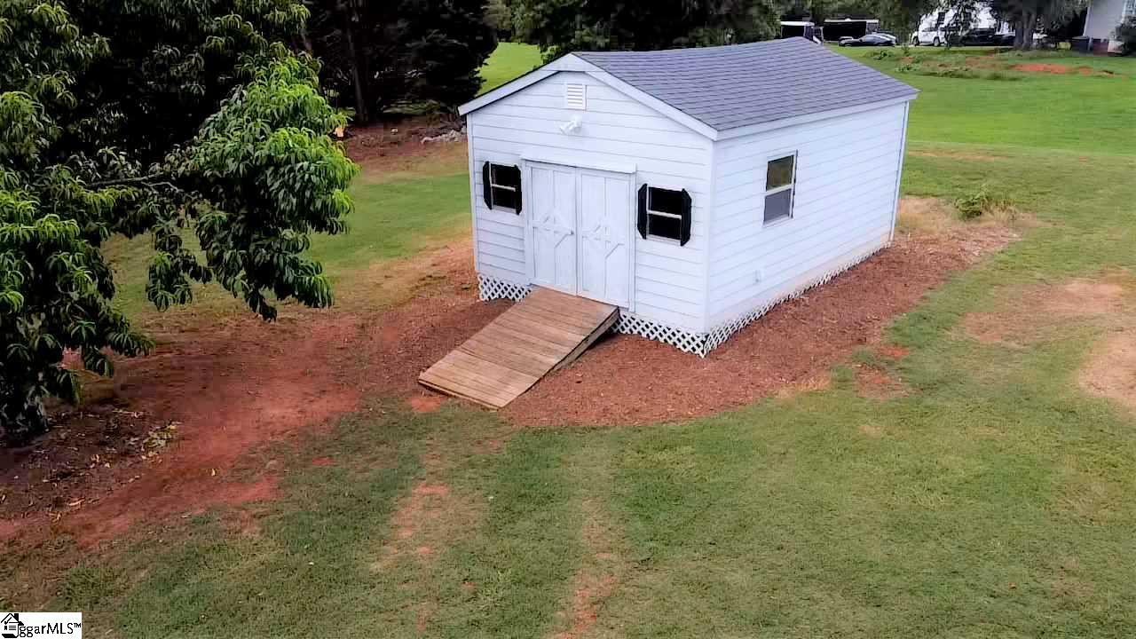 1323 Old Mill Road Easley, SC 29642 - Photo 22 of 24 Workshop/She shed with power and exterior water faucet