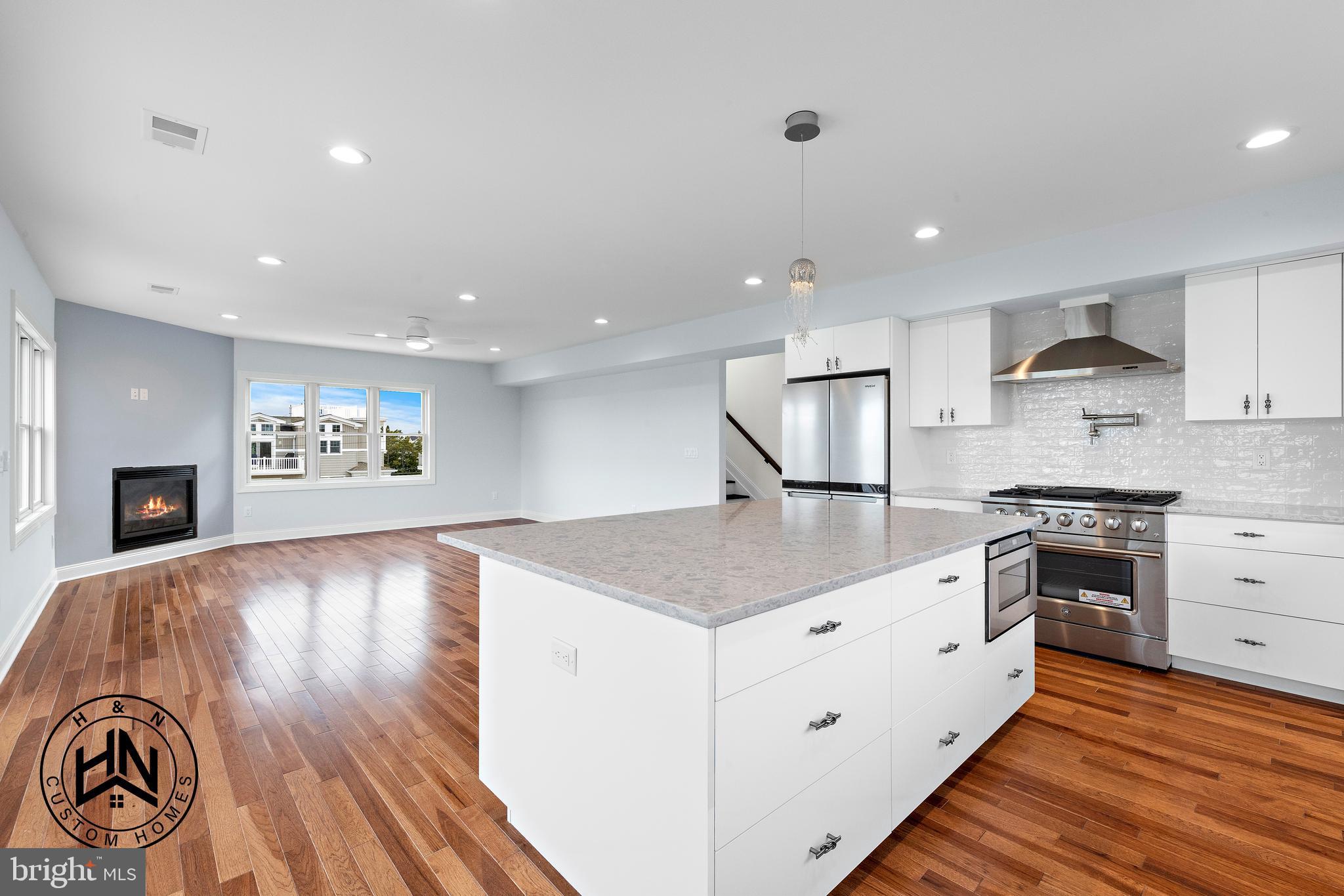 24 West 53rd Street Long Beach Township, NJ 08008 - Photo 25 of 75 a kitchen with a stove and a sink