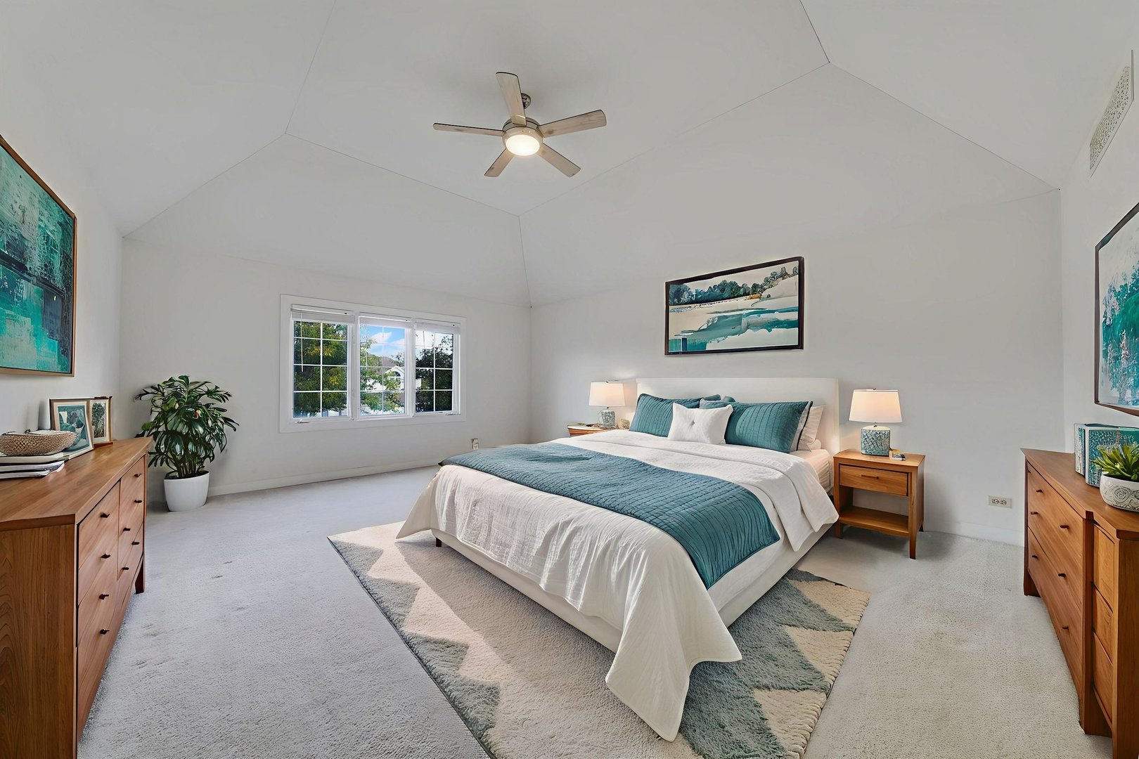 801 West Veterans Parkway Addison, IL 60101 - Photo 20 of 42 a spacious bedroom with a bed a couch and a window