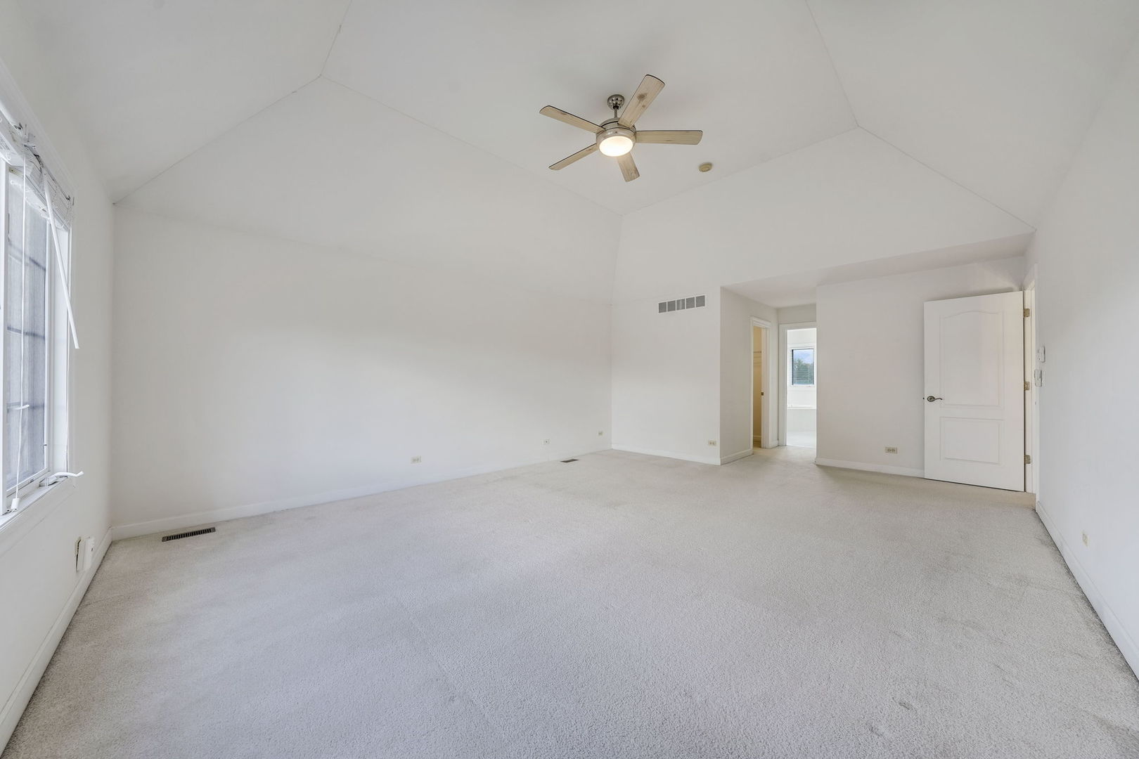 801 West Veterans Parkway Addison, IL 60101 - Photo 22 of 42 wooden floor in an empty room with a window