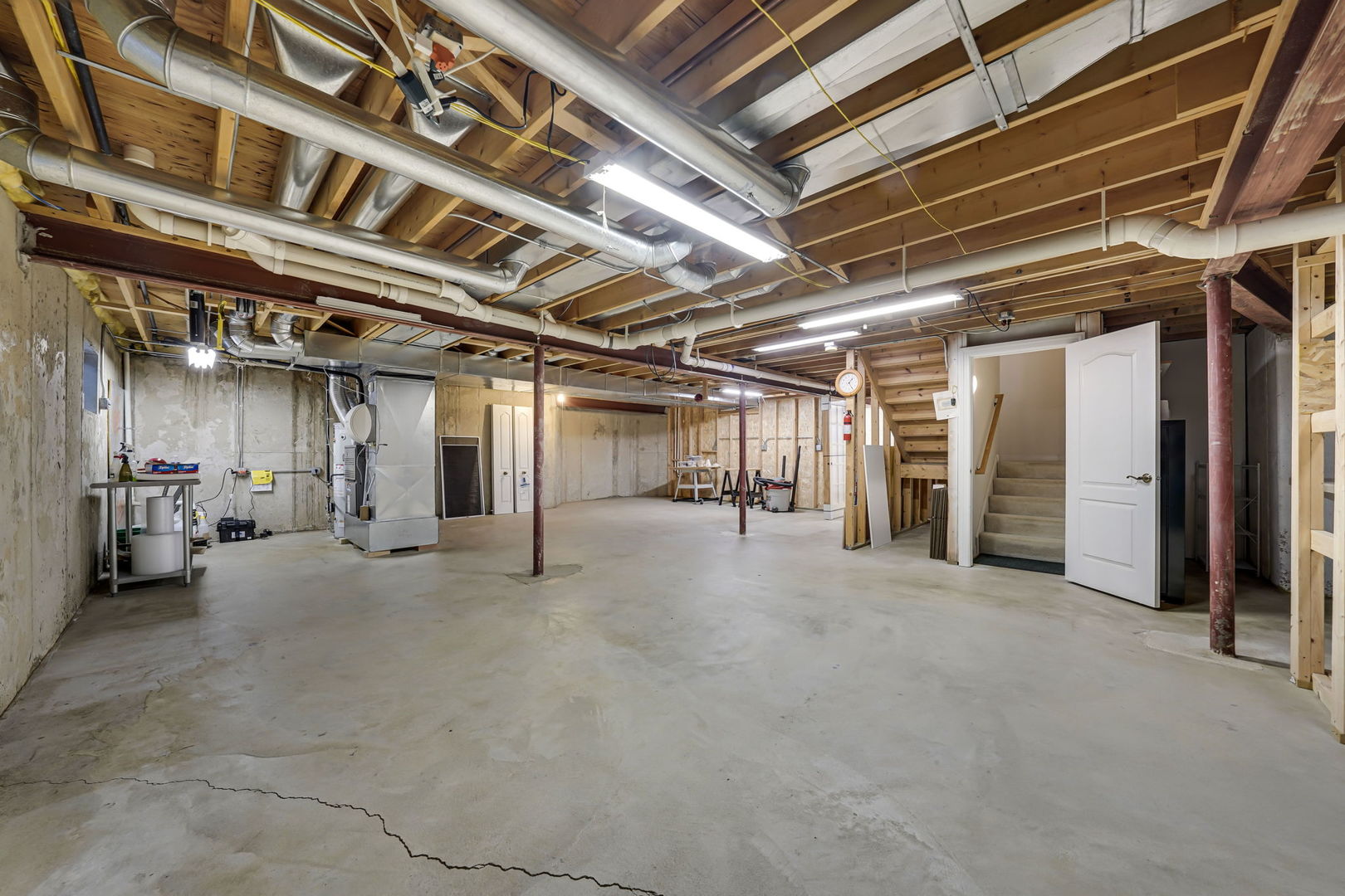 801 West Veterans Parkway Addison, IL 60101 - Photo 33 of 42 a view of large room with wooden ceiling