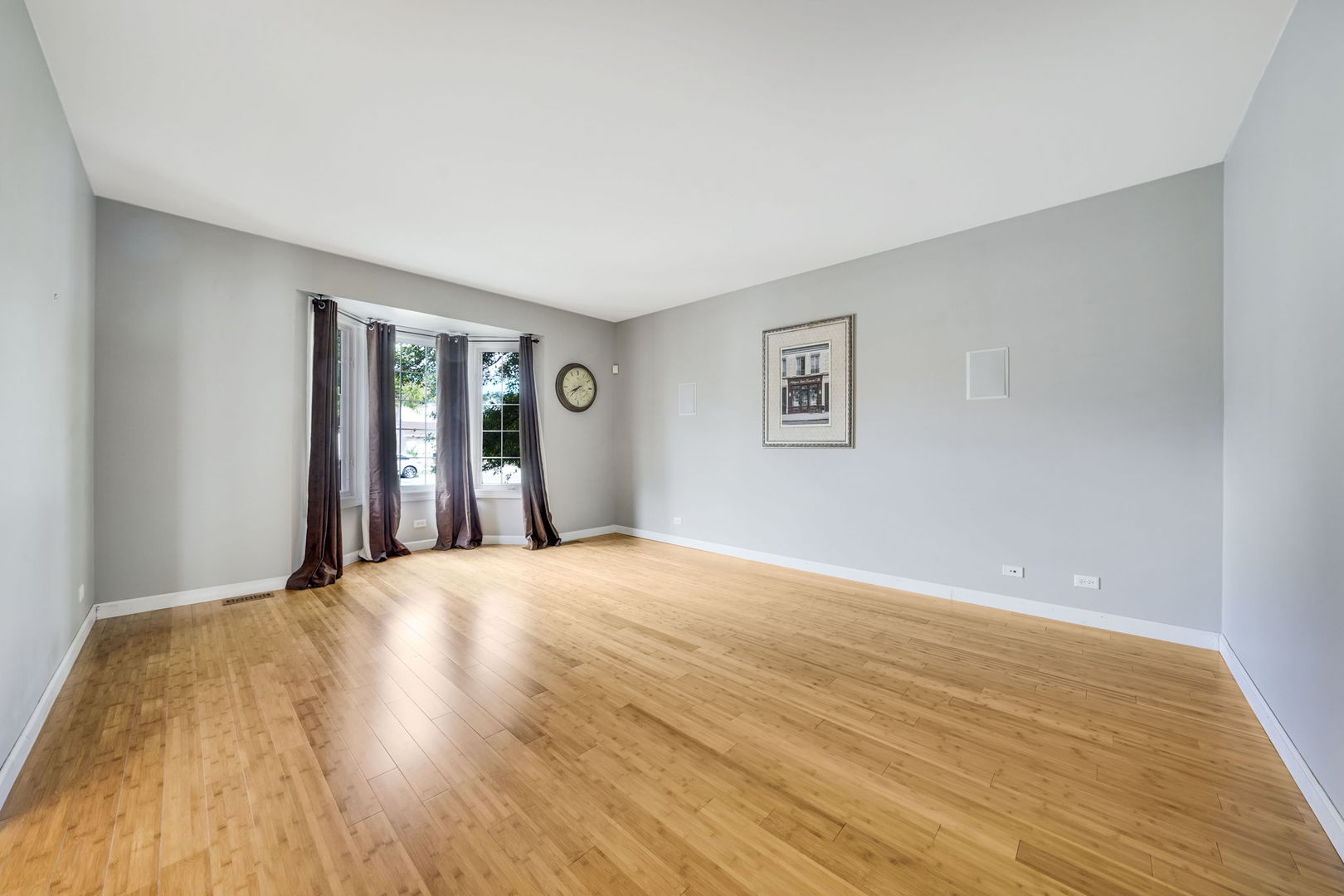 801 West Veterans Parkway Addison, IL 60101 - Photo 4 of 42 a view of an empty room with wooden floor