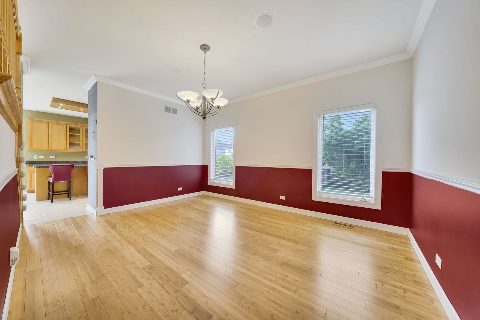 801 West Veterans Parkway Addison, IL 60101 - Photo 8 of 42 a view of livingroom with hardwood floor and kitchen view