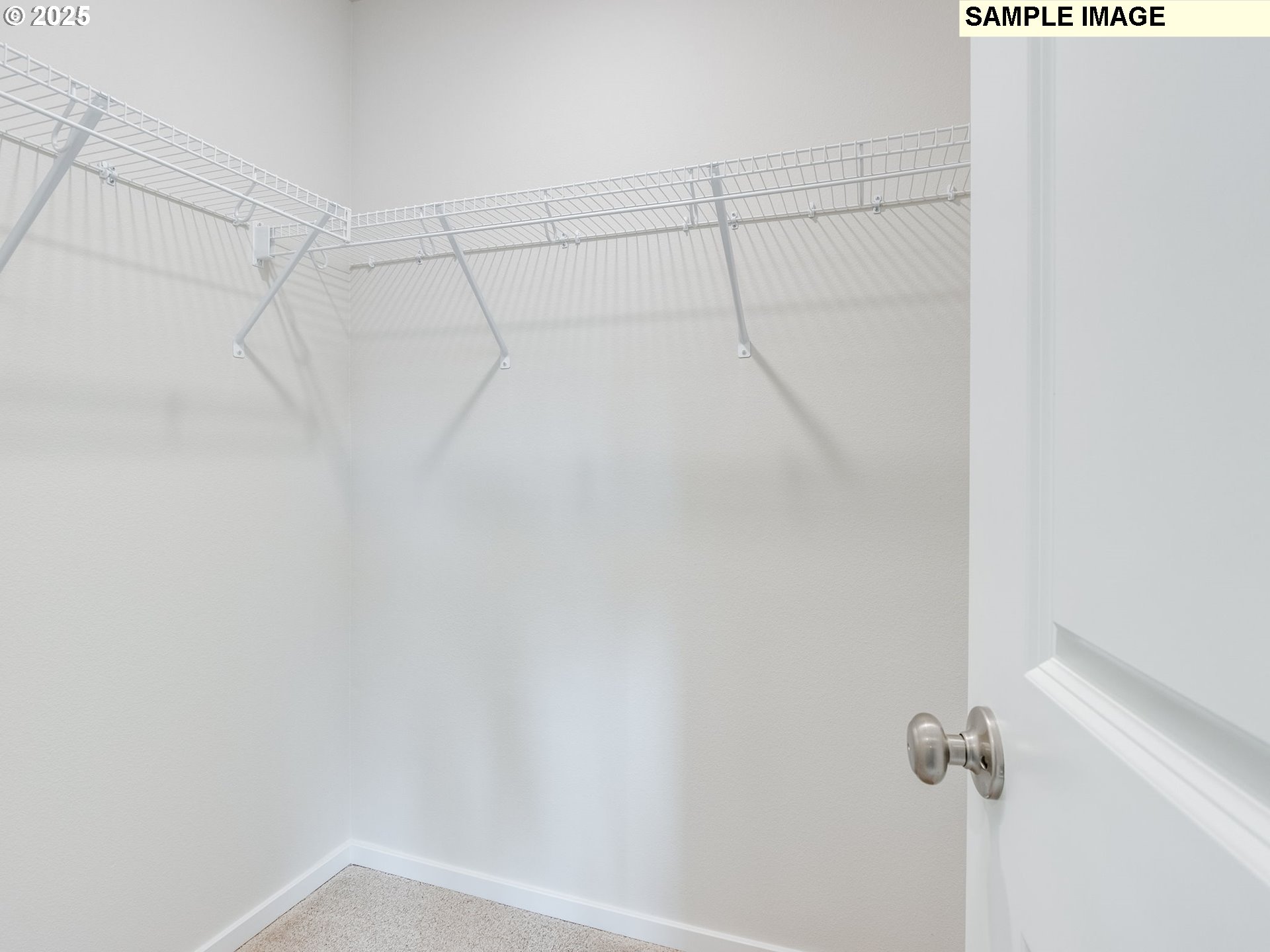 19308 Southeast 11th Way Camas, WA 98607 - Photo 20 of 28 a view of a room with racks on the wall