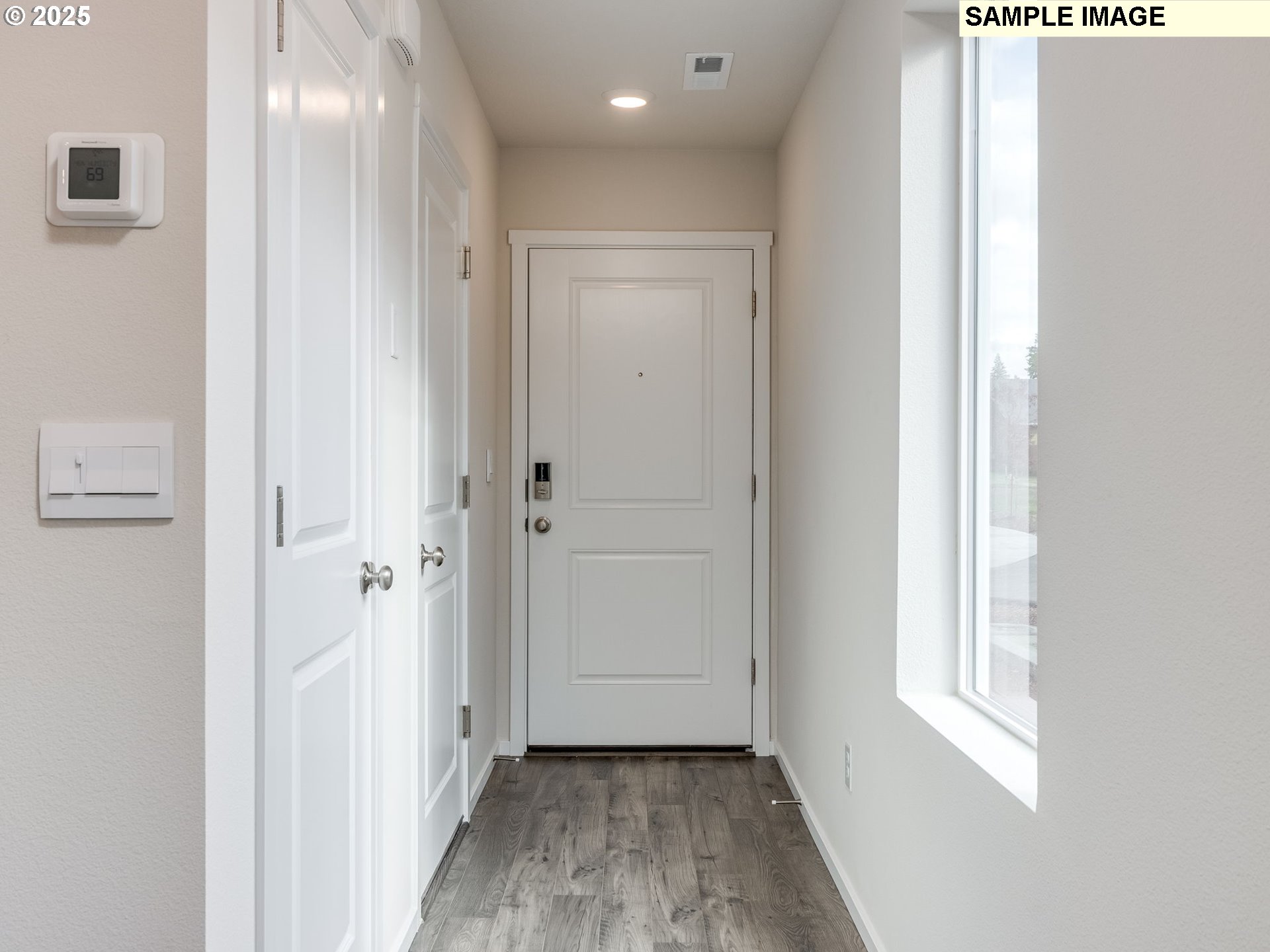 19308 Southeast 11th Way Camas, WA 98607 - Photo 2 of 28 a view of a hallway with wooden floor