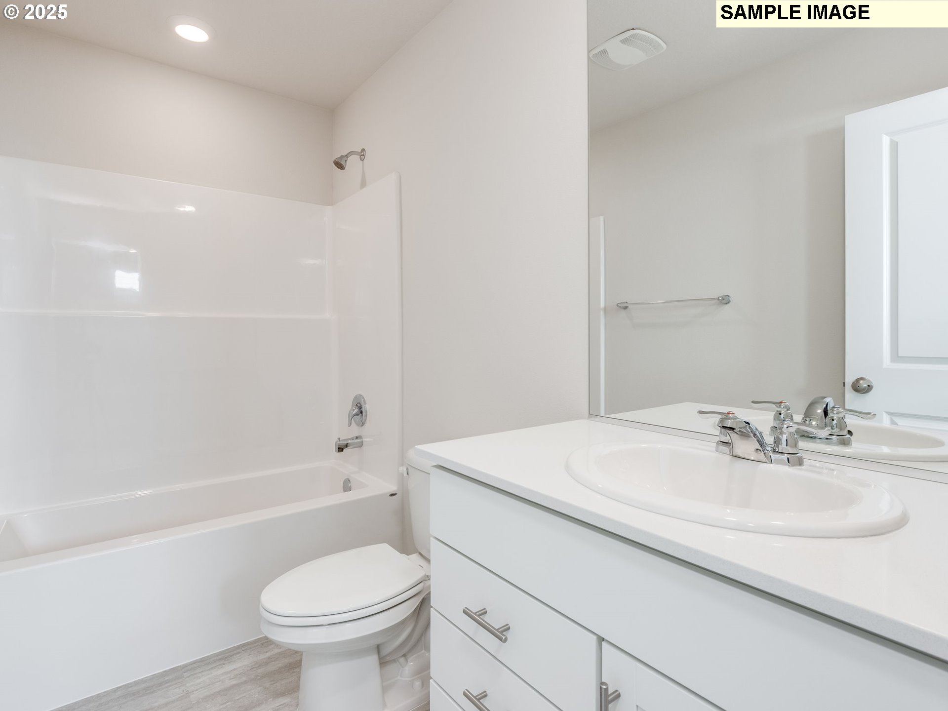 19308 Southeast 11th Way Camas, WA 98607 - Photo 21 of 28 a bathroom with a sink toilet vanity and shower