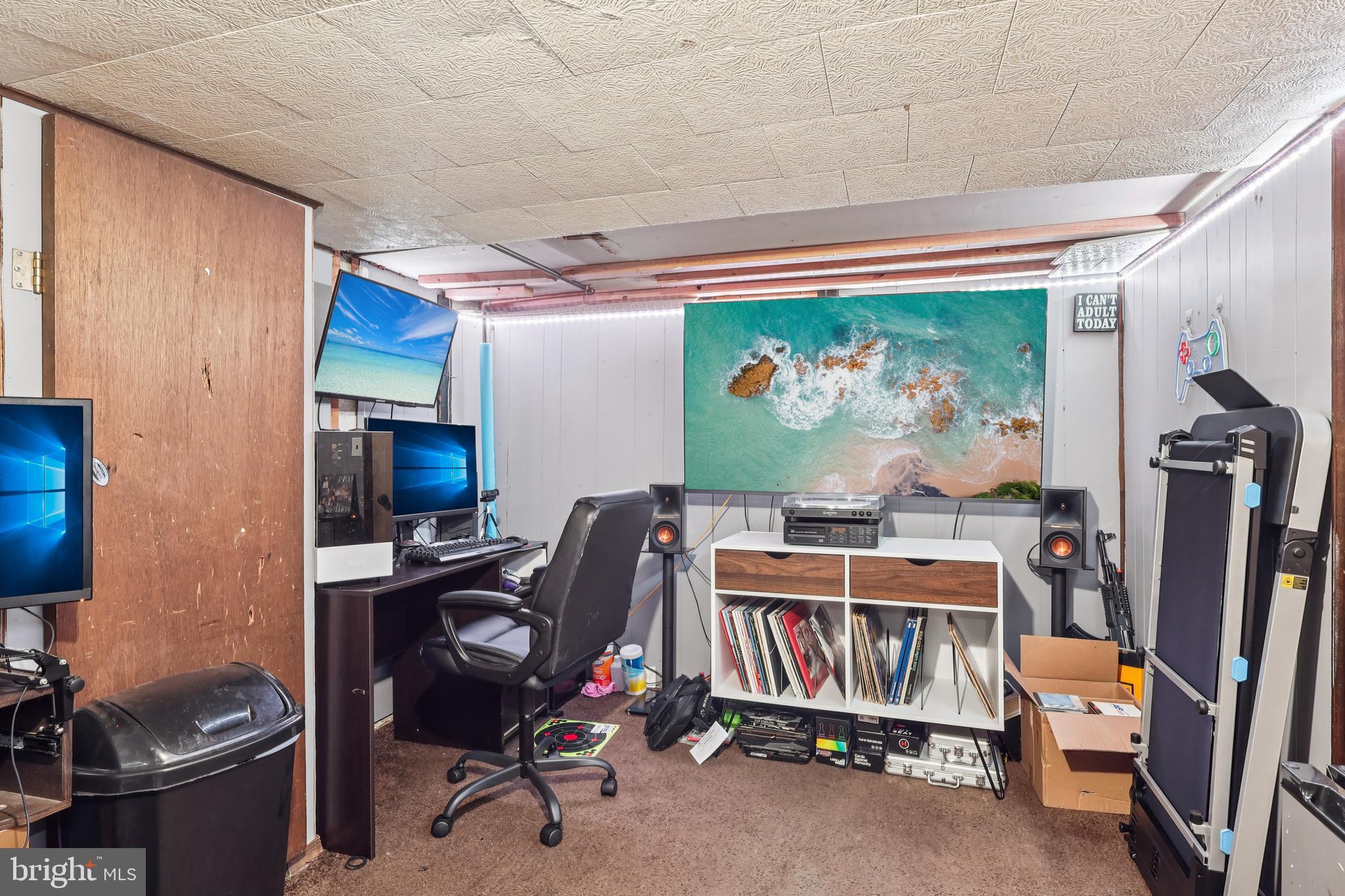 305 Filmore Street Riverside, NJ 08075 - Photo 17 of 32 a room with furniture a flat screen tv and a window