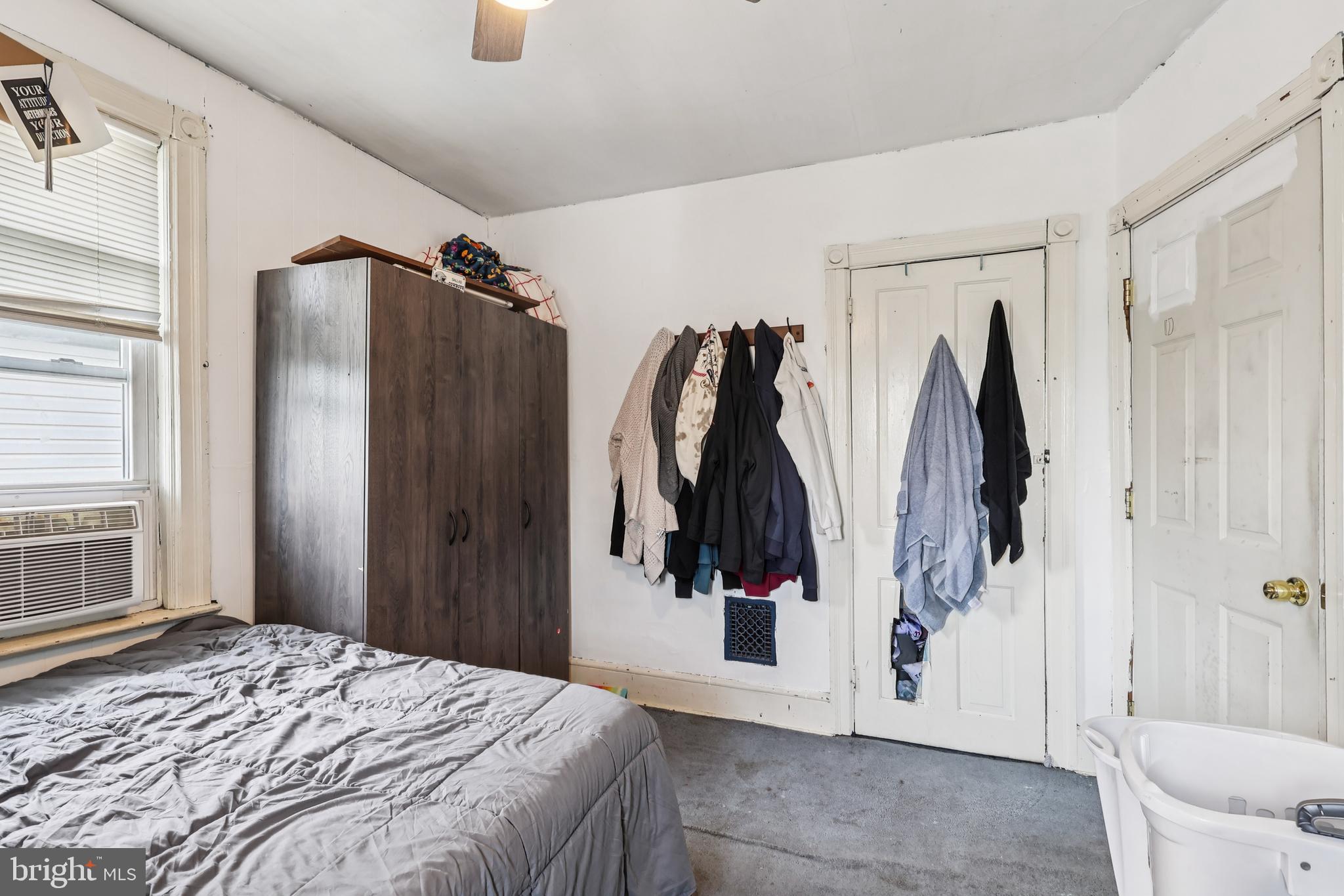 305 Filmore Street Riverside, NJ 08075 - Photo 19 of 32 a bed room with a walk in closet and bathroom