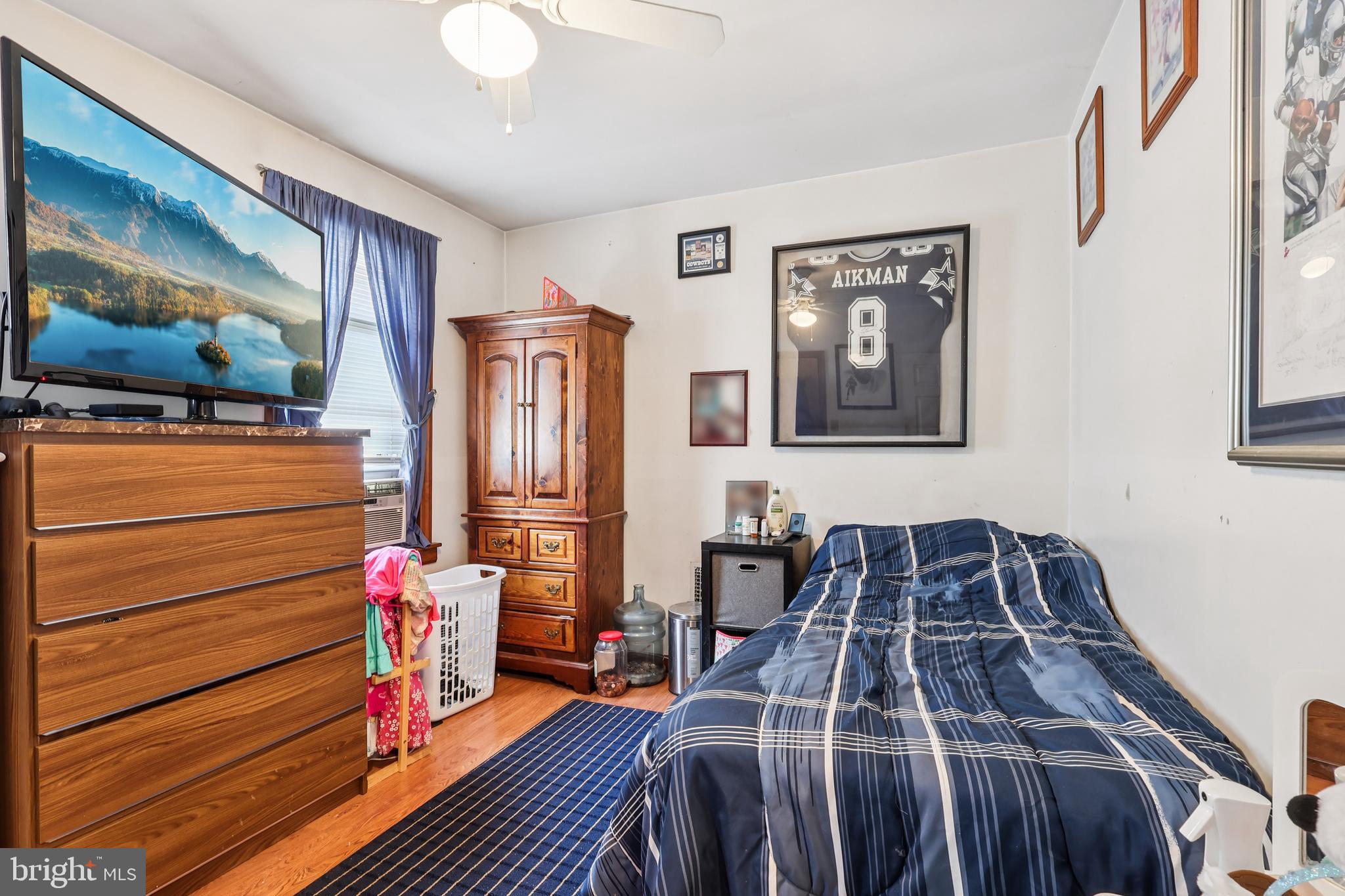 305 Filmore Street Riverside, NJ 08075 - Photo 20 of 32 a bedroom with bed and wooden floor
