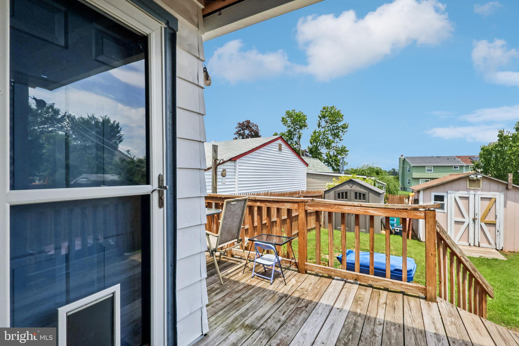 305 Filmore Street Riverside, NJ 08075 - Photo 26 of 32 a view of a wooden deck with a yard