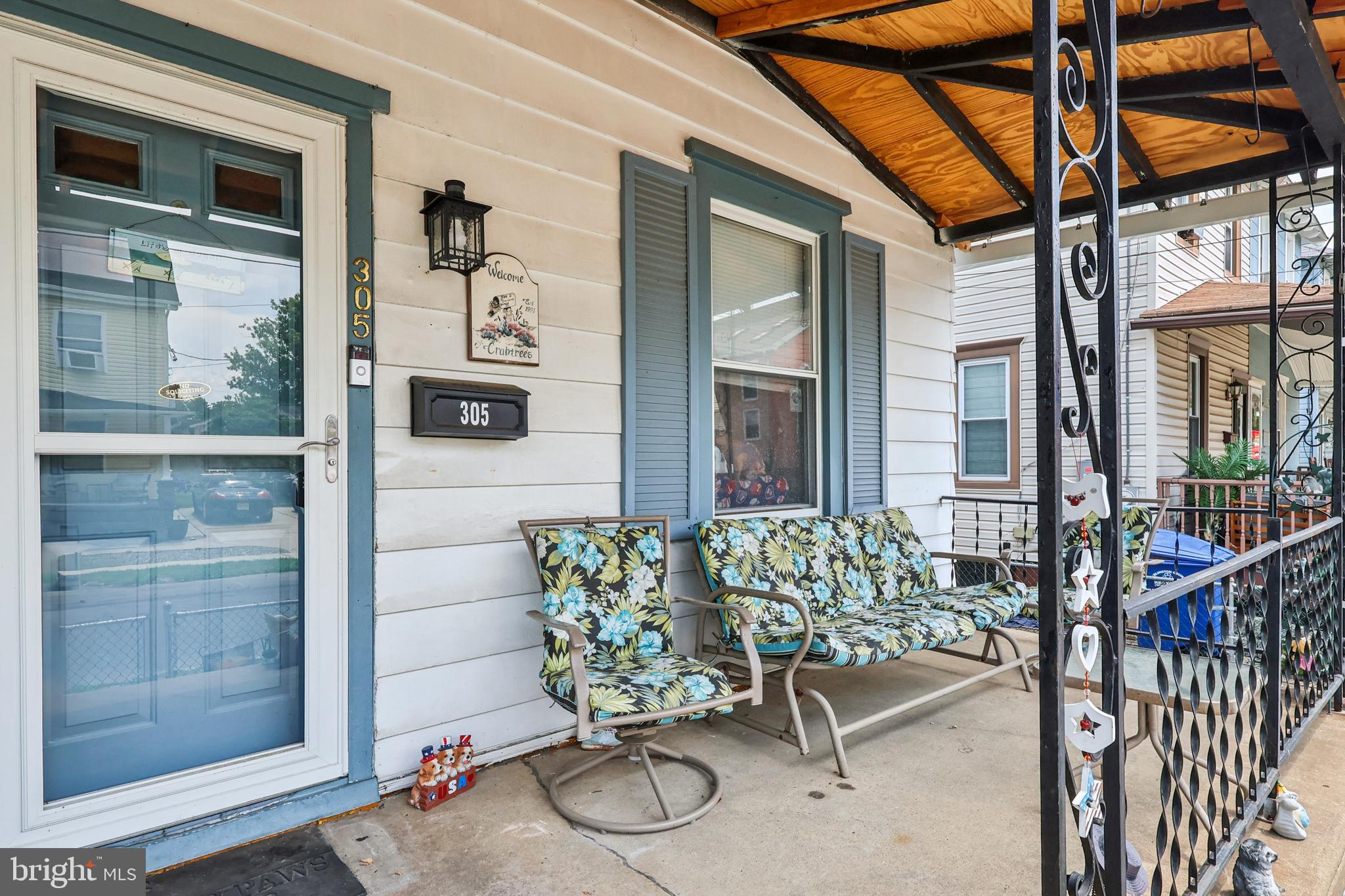 305 Filmore Street Riverside, NJ 08075 - Photo 4 of 32 a balcony with table and chairs