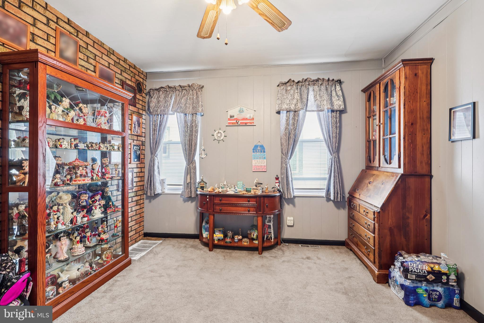 305 Filmore Street Riverside, NJ 08075 - Photo 6 of 32 a room with furniture and a chandelier