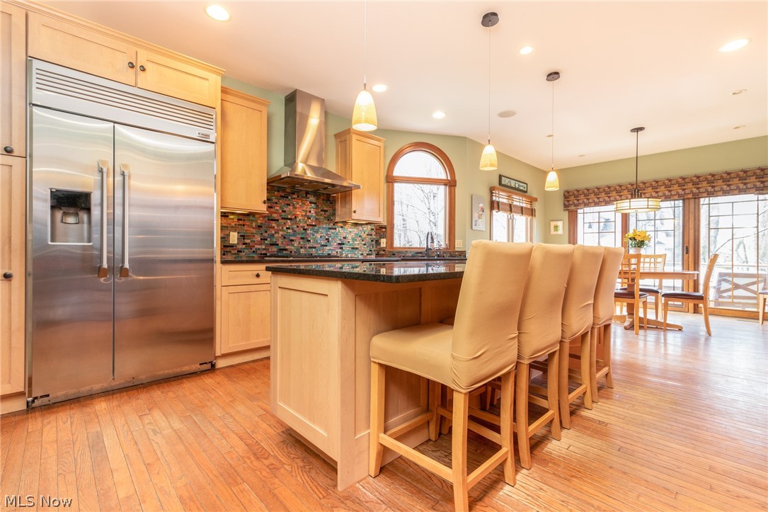 5580 High Point Road Solon, OH 44139 - Photo 15 of 35 Oversize refrigerator and stainless steel hood over the stovetop