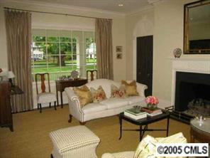 1626 Queens Road Charlotte, NC 28207 - Photo 4 of 8 a living room with furniture and a fireplace