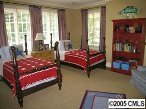 1626 Queens Road Charlotte, NC 28207 - Photo 8 of 8 a bedroom with a bed and window