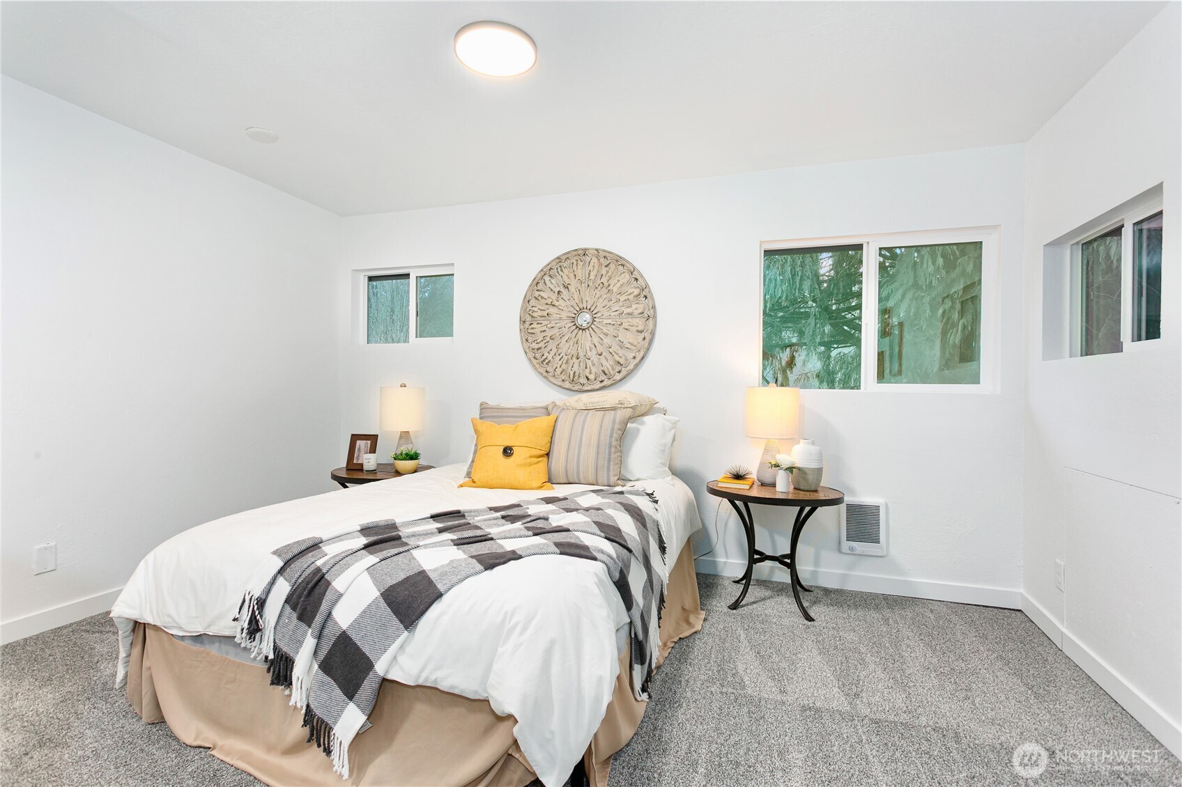 8021 Northeast Eglon Road Kingston, WA 98346 - Photo 18 of 35 a bedroom with a bed and a window