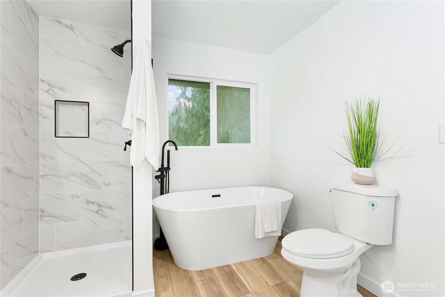 8021 Northeast Eglon Road Kingston, WA 98346 - Photo 21 of 35 a bathroom with a toilet a sink and a bathtub