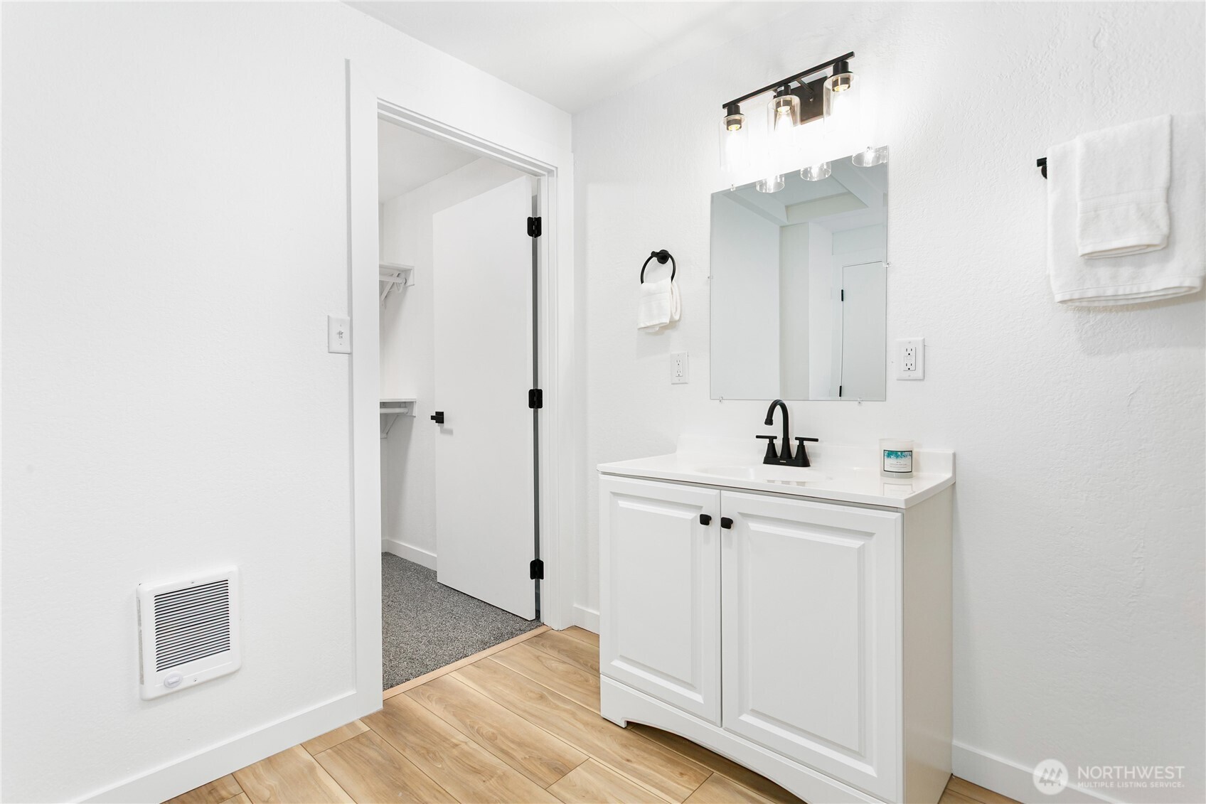 8021 Northeast Eglon Road Kingston, WA 98346 - Photo 22 of 35 a bathroom with a sink a mirror and a shower