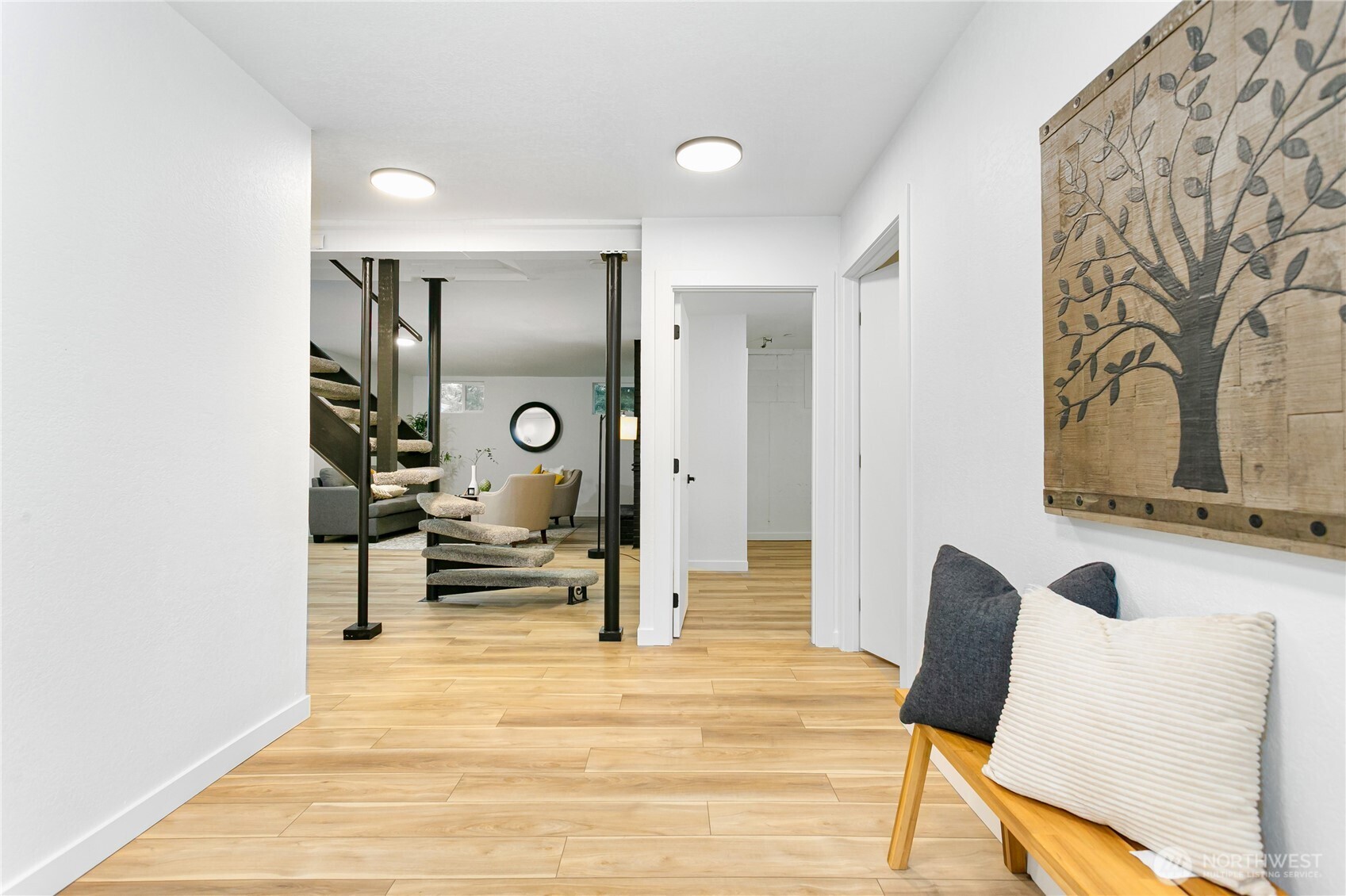 8021 Northeast Eglon Road Kingston, WA 98346 - Photo 26 of 35 a bedroom with furniture and a potted plant