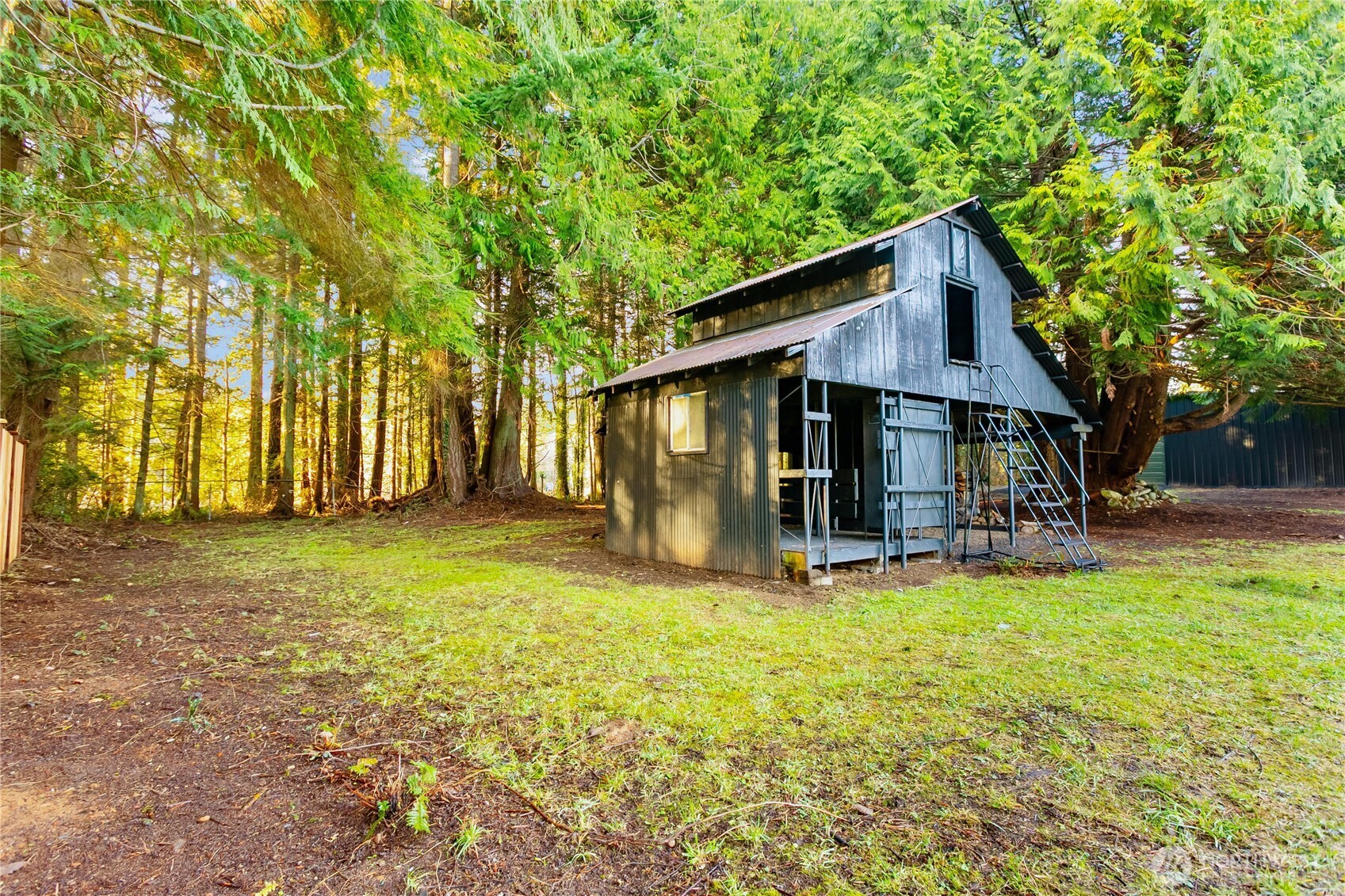 8021 Northeast Eglon Road Kingston, WA 98346 - Photo 34 of 35 a view of a house with pool and sitting area