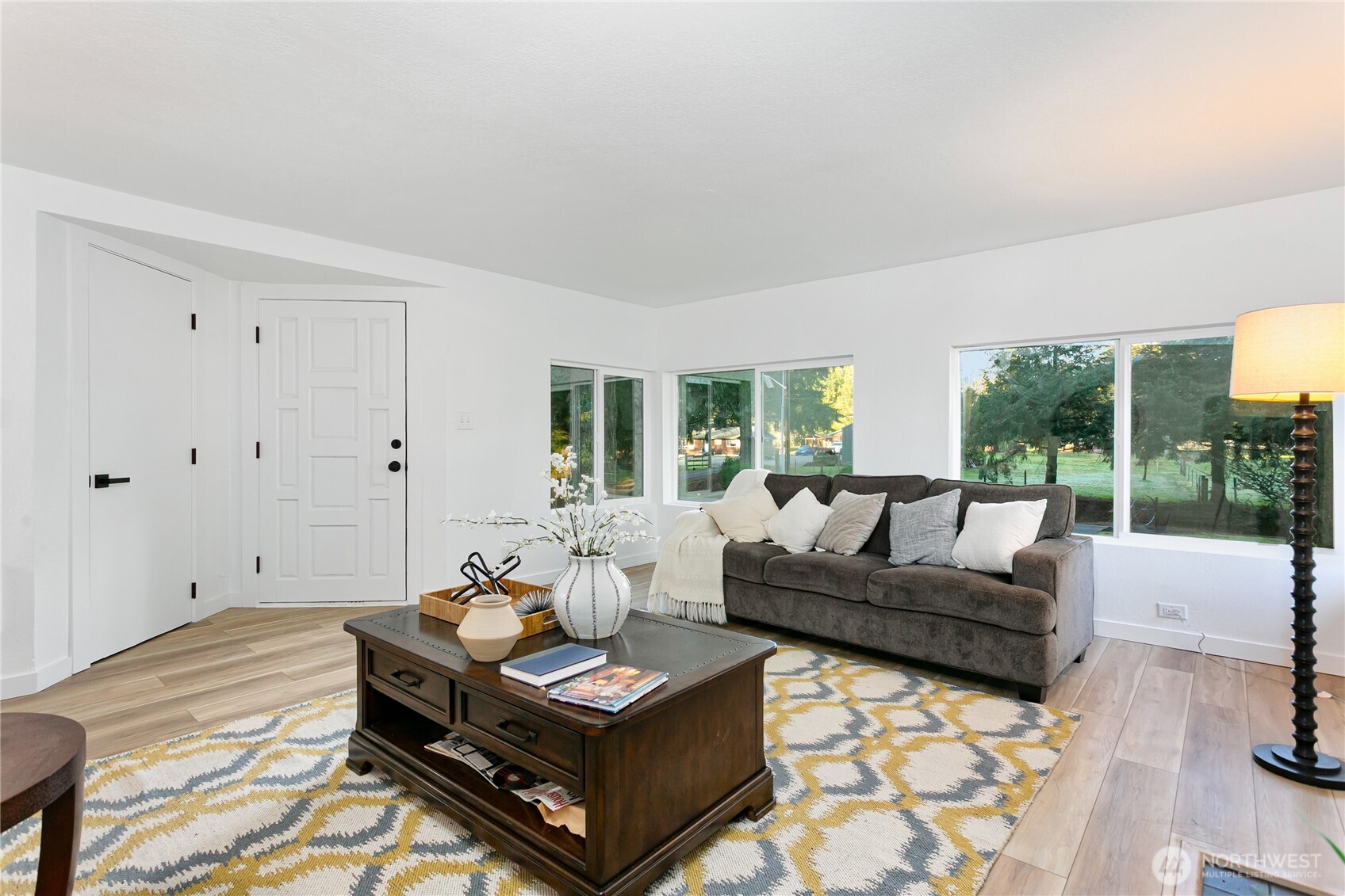 8021 Northeast Eglon Road Kingston, WA 98346 - Photo 4 of 35 a living room with furniture and a large window