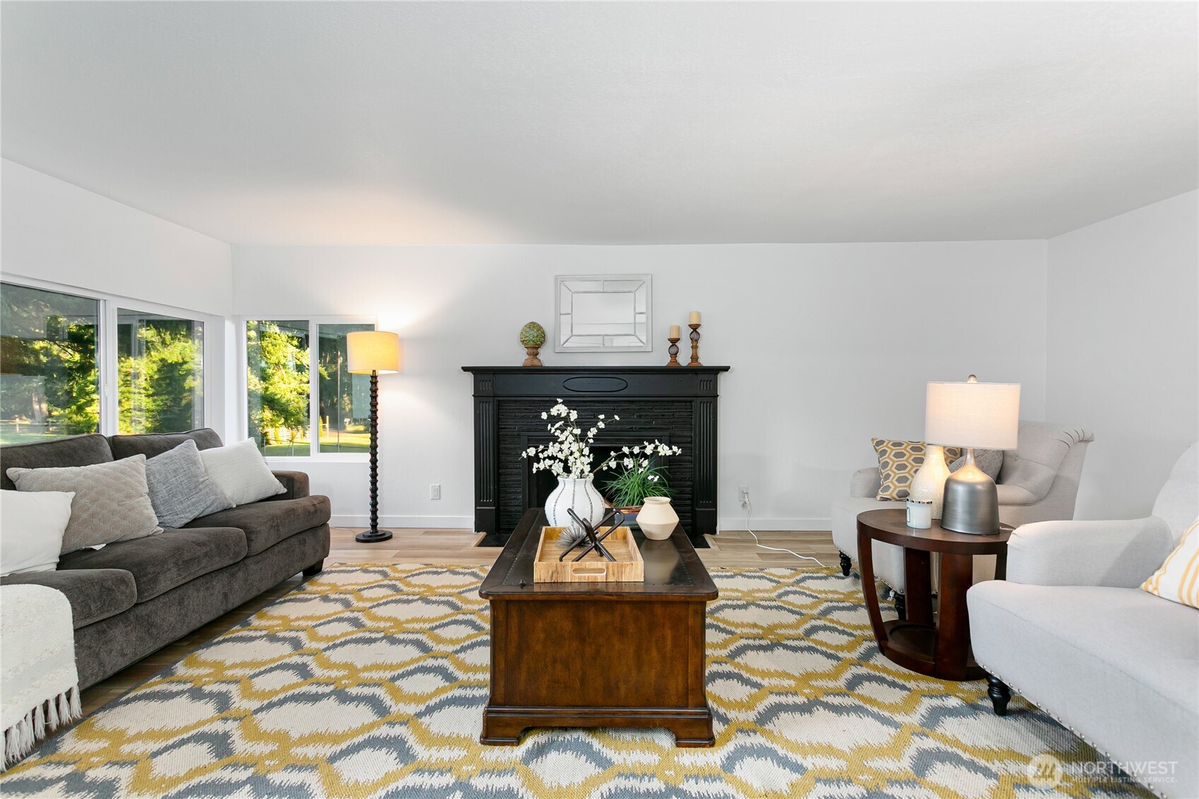 8021 Northeast Eglon Road Kingston, WA 98346 - Photo 6 of 35 a living room with furniture and a fireplace