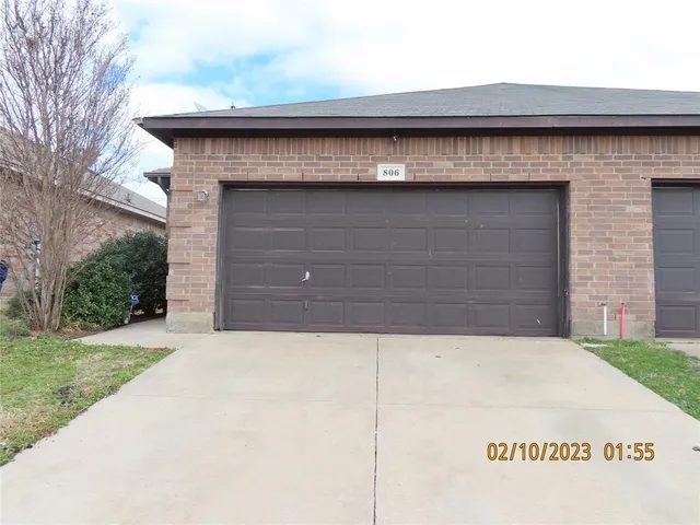 a stone house with a outdoor space