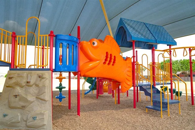 a view of a swimming pool with a deck