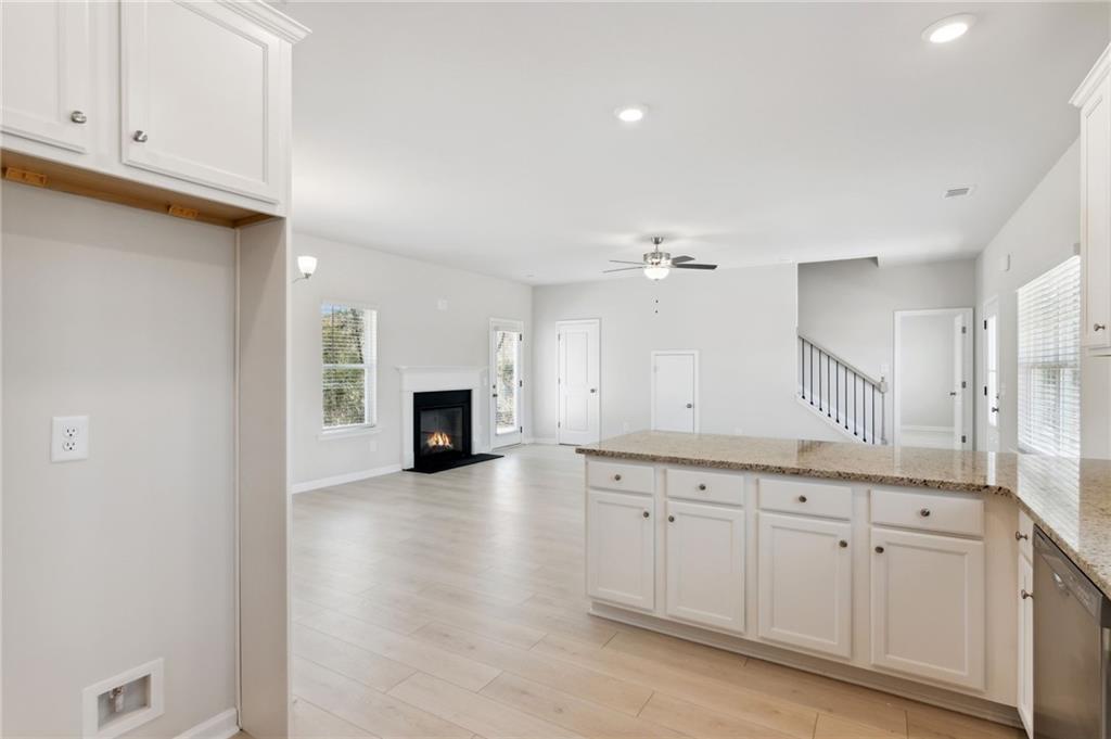 79 Water Oak Way Crawford, GA 30630 - Photo 13 of 51 a view of a kitchen with furniture and fireplace