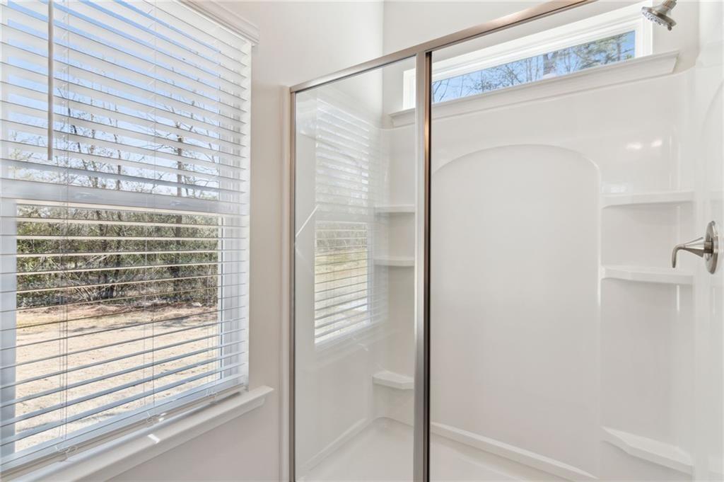 79 Water Oak Way Crawford, GA 30630 - Photo 30 of 51 a bathroom with a shower