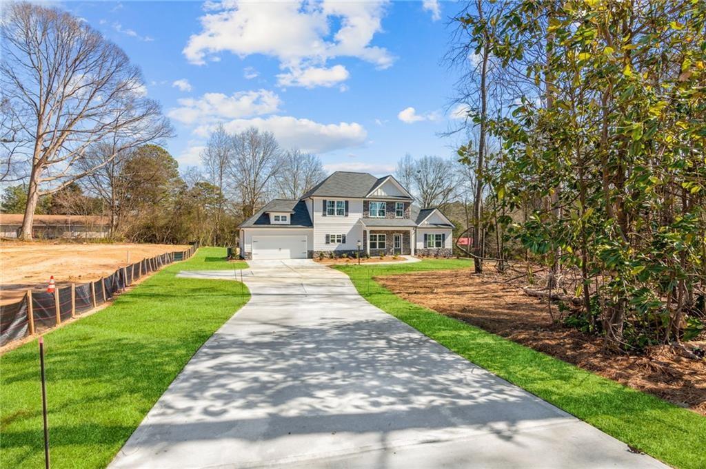 79 Water Oak Way Crawford, GA 30630 - Photo 4 of 51 a view of yard with swimming pool and green space