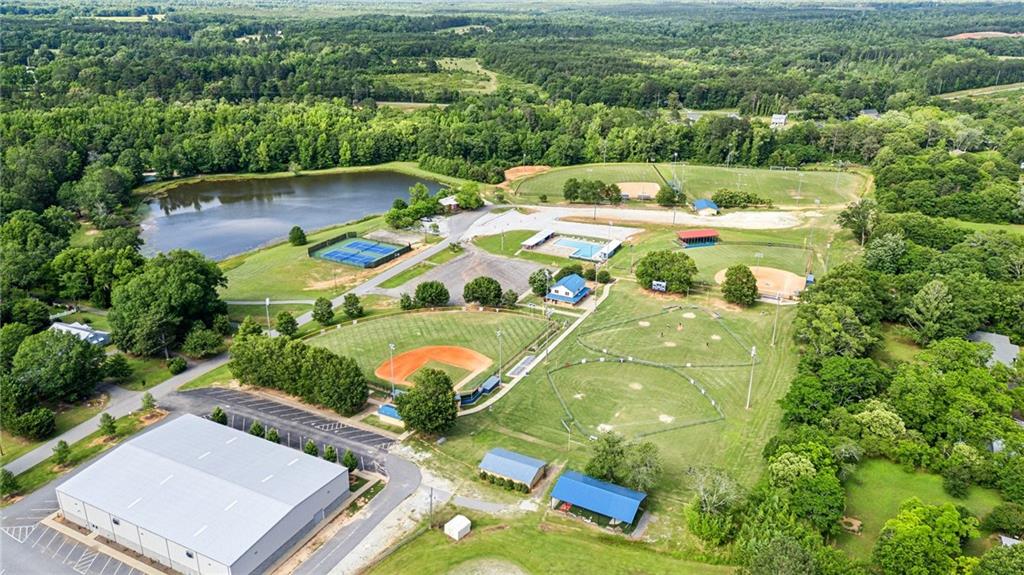 79 Water Oak Way Crawford, GA 30630 - Photo 50 of 51 an aerial view of a house with swimming pool outdoor seating and yard