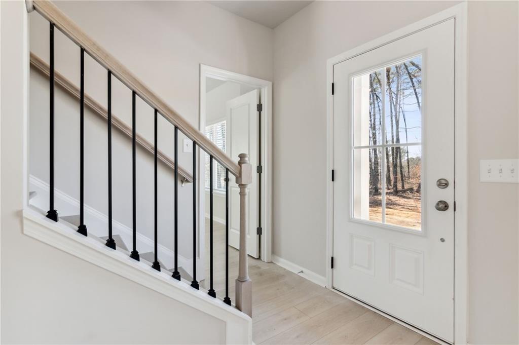 79 Water Oak Way Crawford, GA 30630 - Photo 5 of 51 a view of an entryway with staircase