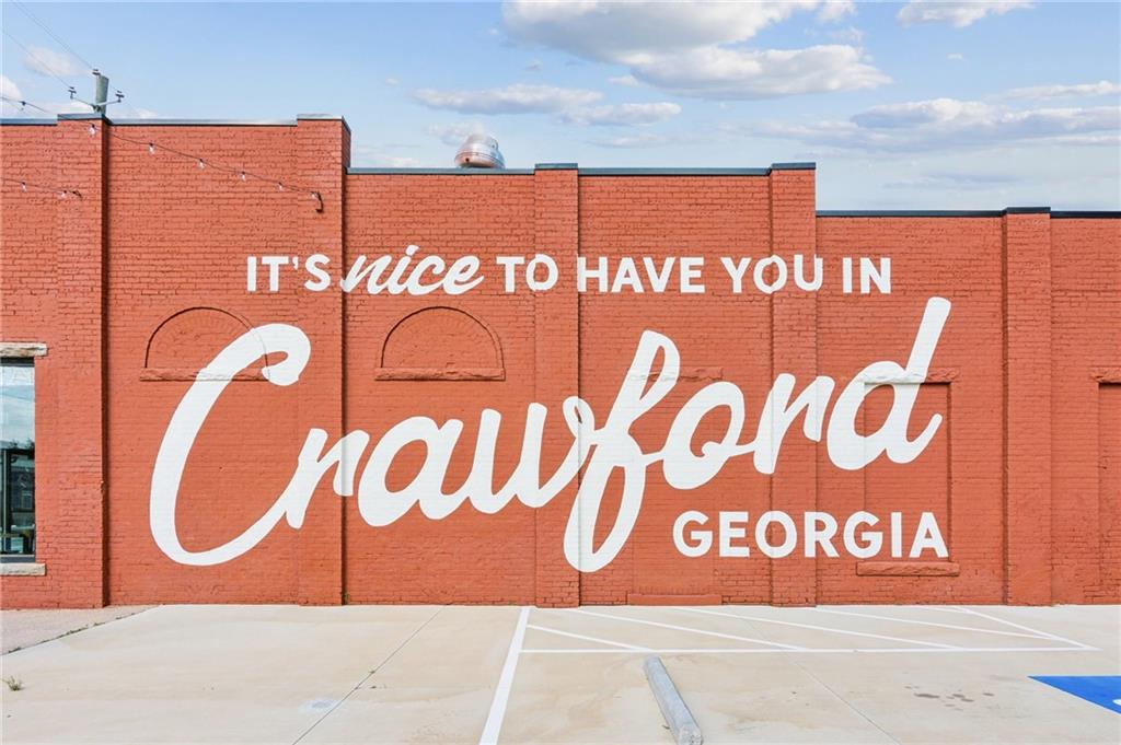 79 Water Oak Way Crawford, GA 30630 - Photo 51 of 51 a sign that is on the wall of building