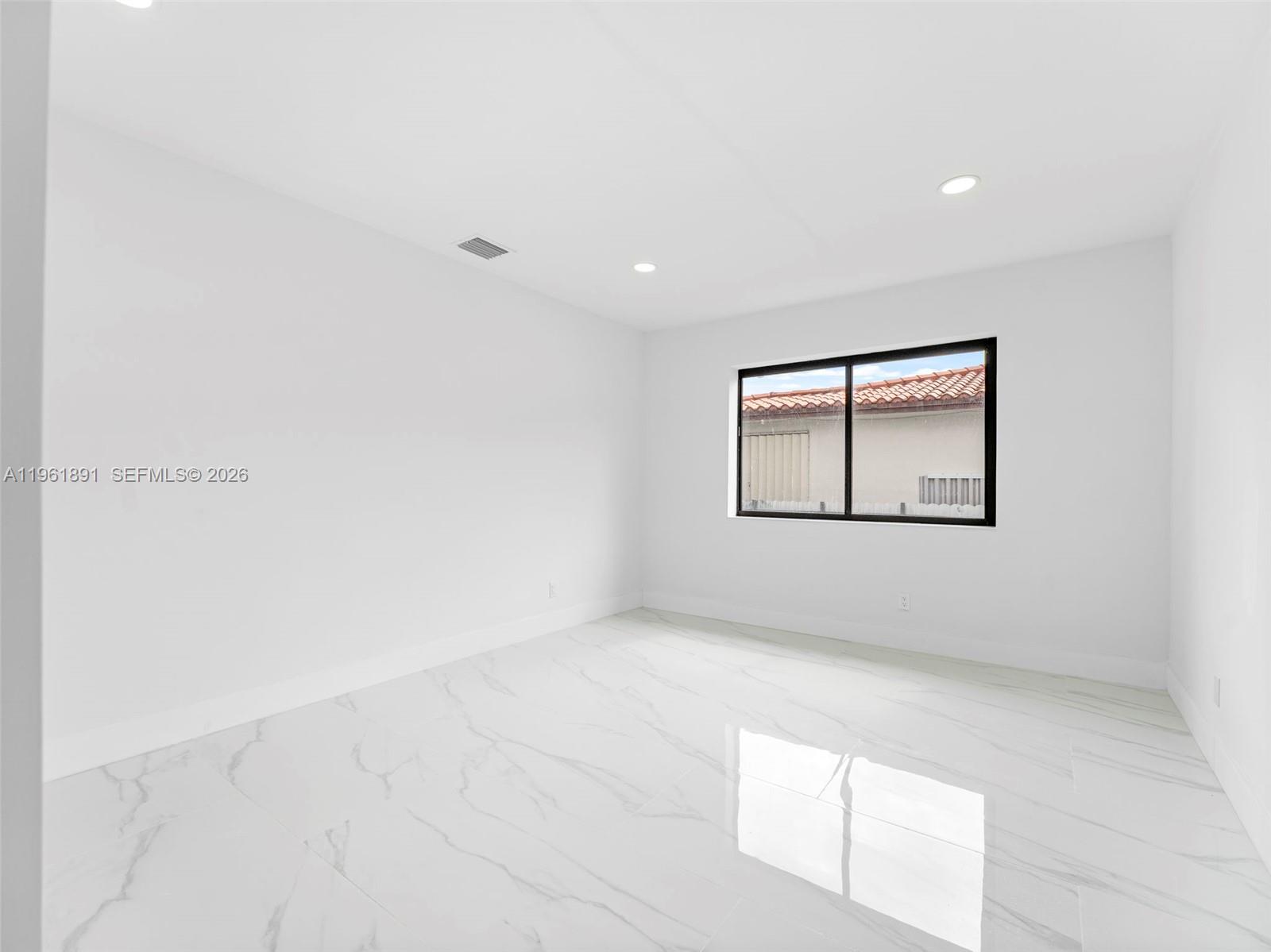 2500 Southwest 23rd Terrace Miami, FL 33145 - Photo 15 of 36 a view of an empty room