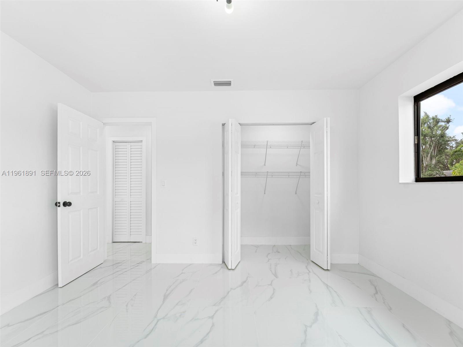 2500 Southwest 23rd Terrace Miami, FL 33145 - Photo 19 of 36 a view of an empty room