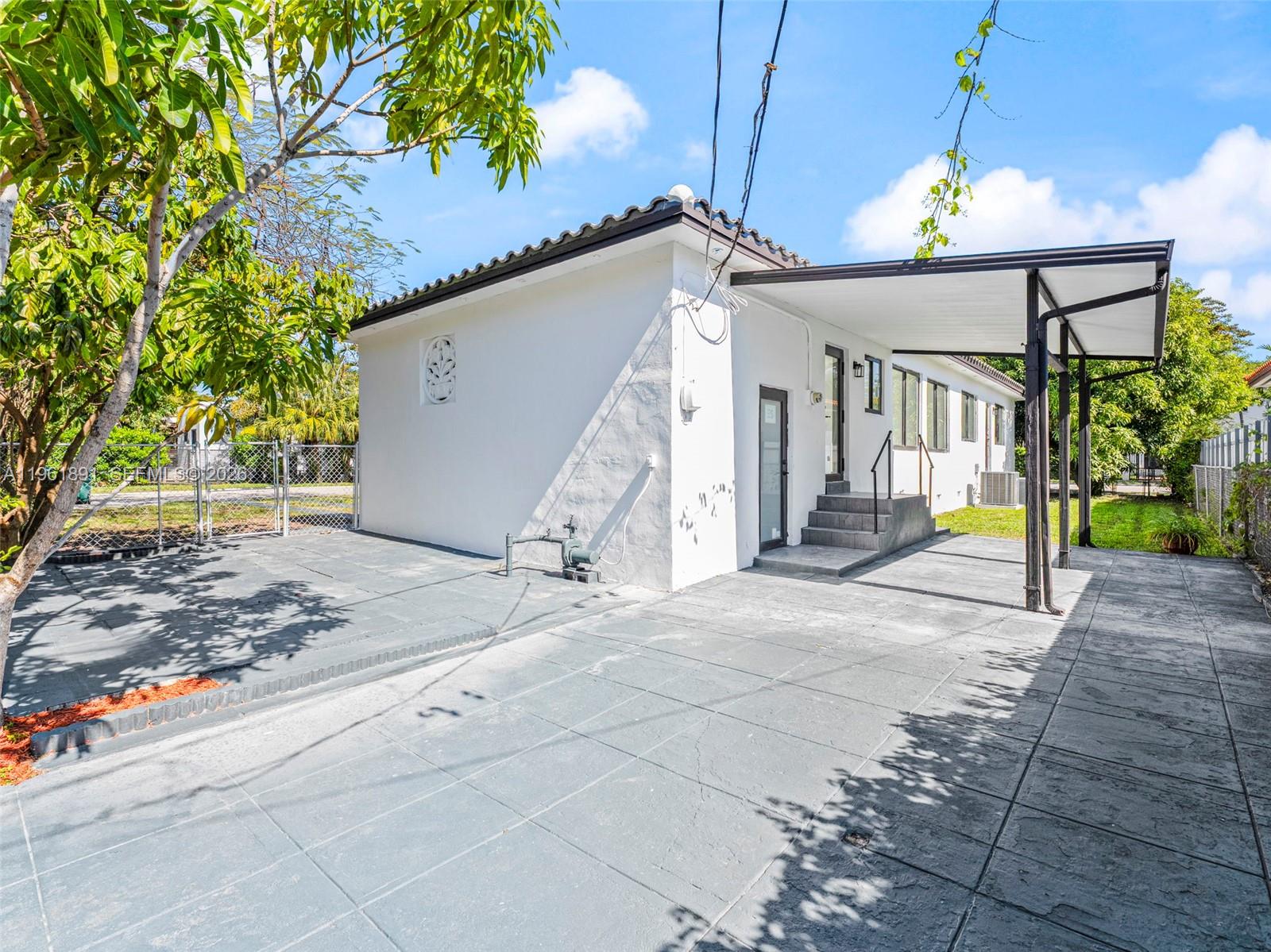 2500 Southwest 23rd Terrace Miami, FL 33145 - Photo 25 of 36 a view of a house with a street