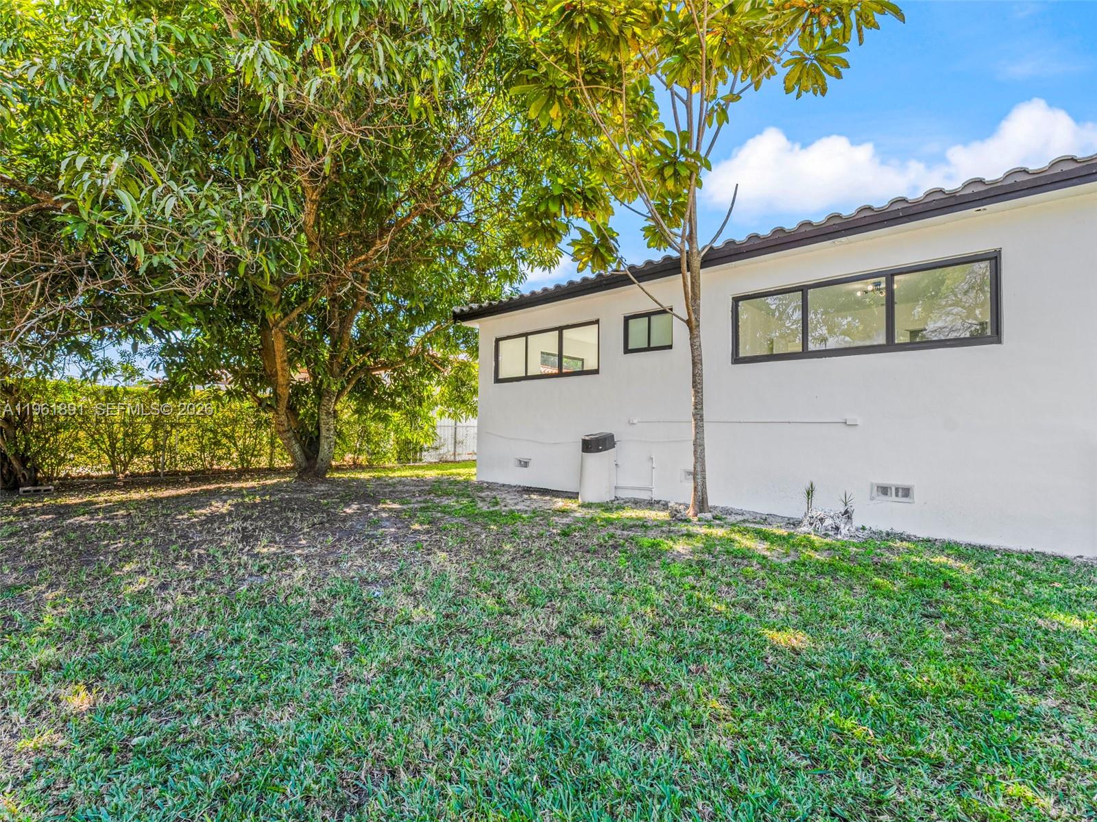 2500 Southwest 23rd Terrace Miami, FL 33145 - Photo 27 of 36 a backyard of a house with lots of green space