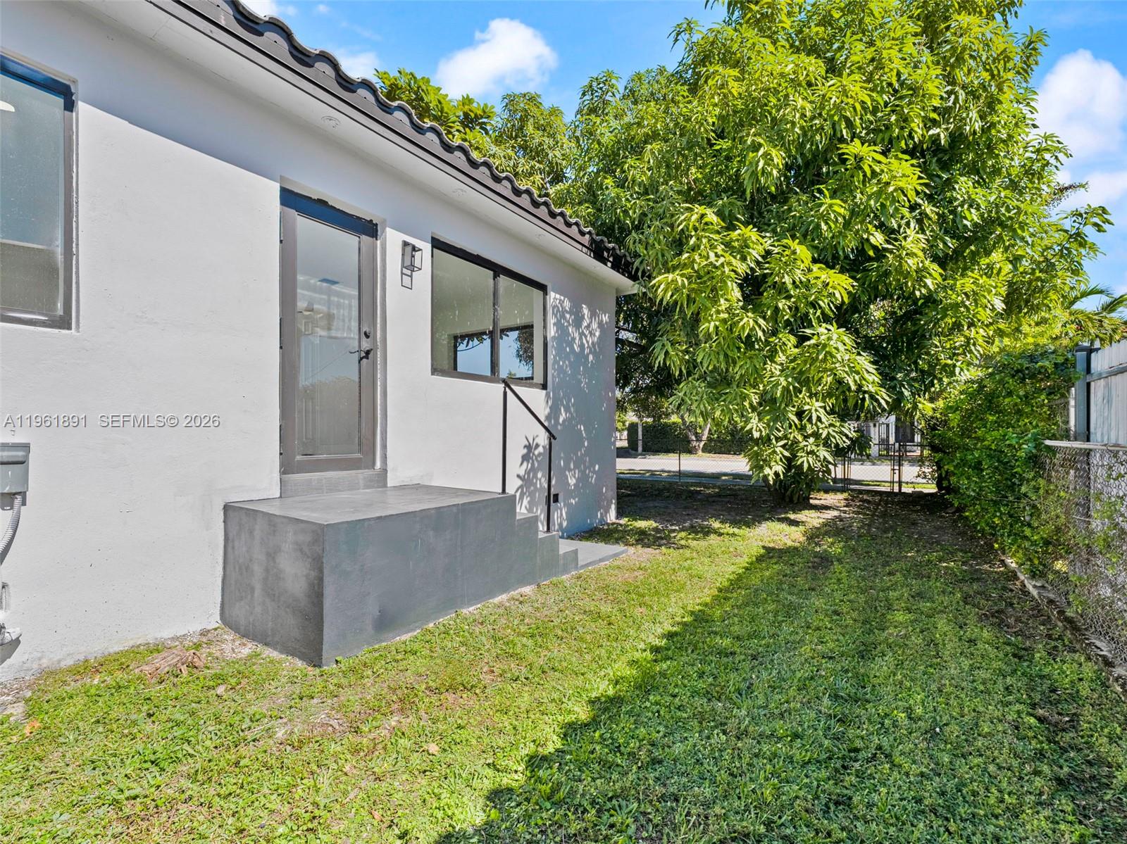 2500 Southwest 23rd Terrace Miami, FL 33145 - Photo 28 of 36 a view of a house with backyard and sitting area
