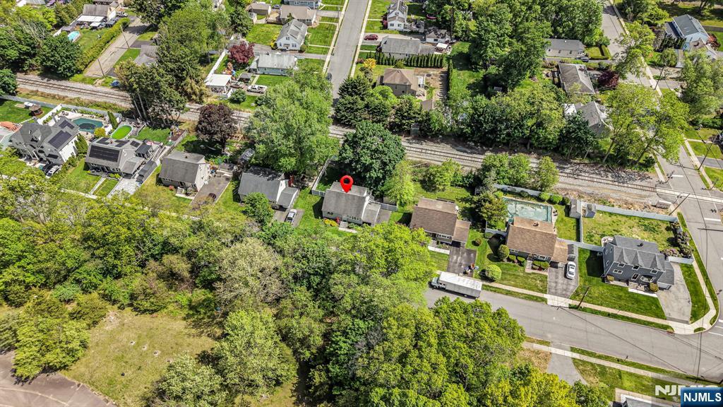 52 Barbara Drive Pompton Lakes, NJ 07442 - Photo 28 of 30 an aerial view of residential house with outdoor space and trees all around