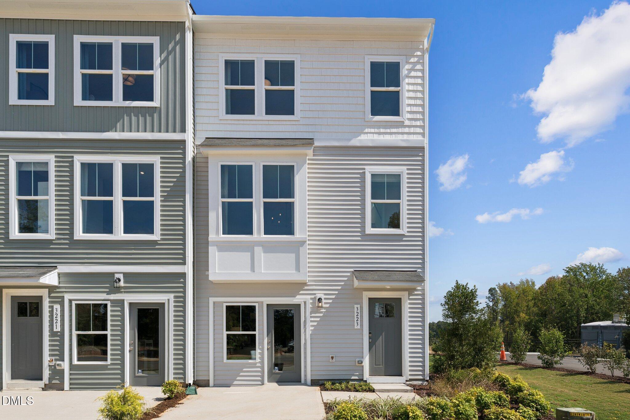 3314 Bomore Road Raleigh, NC 27610 - Photo 4 of 27 a view of a building with a tree