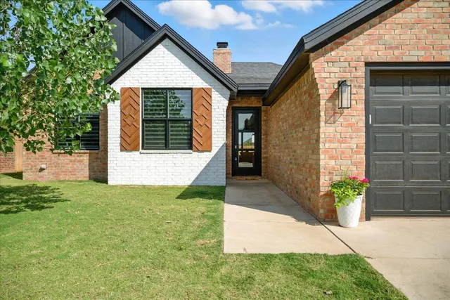 a view of a house with a garden