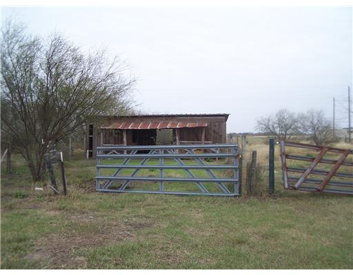 5474 Sunset Trail Robstown, TX 78380 - Photo 3 of 5 a view of a house with a yard