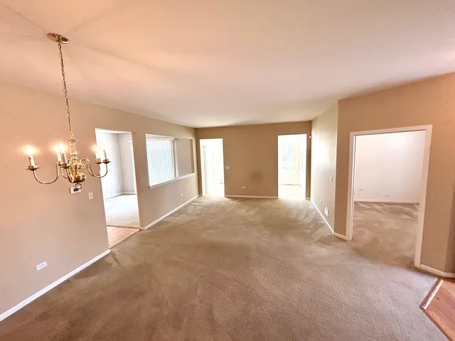 a view of a livingroom with a staircase
